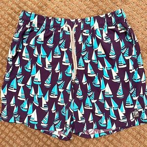 Tom and Teddy size medium swim shorts with inner liner. Like new.